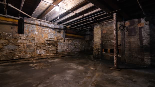 Interior of old grungy warehouse basement.