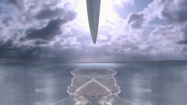 a UFO hovers vertically over the water