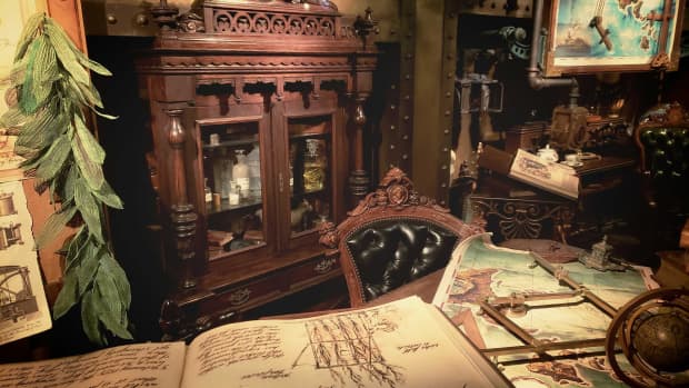 an antique cabinet in a cluttered office