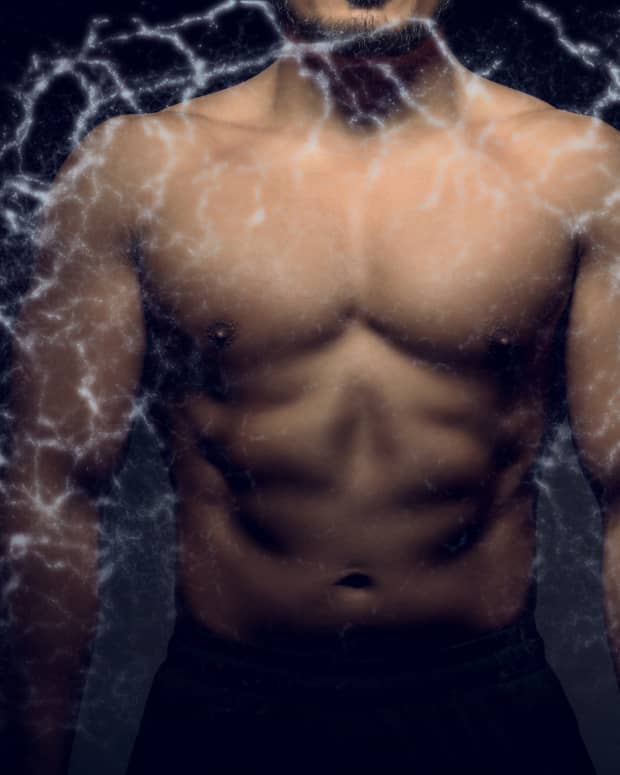 Energy in the form of lighting crackles around a male human torso