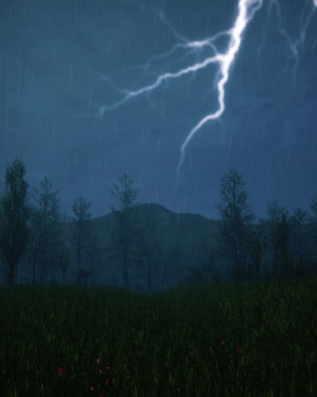 Lightning over a mountainous forest in a storm at night.
