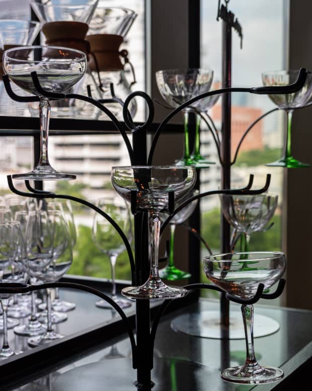 stemmed glasses in a wrought iron holder