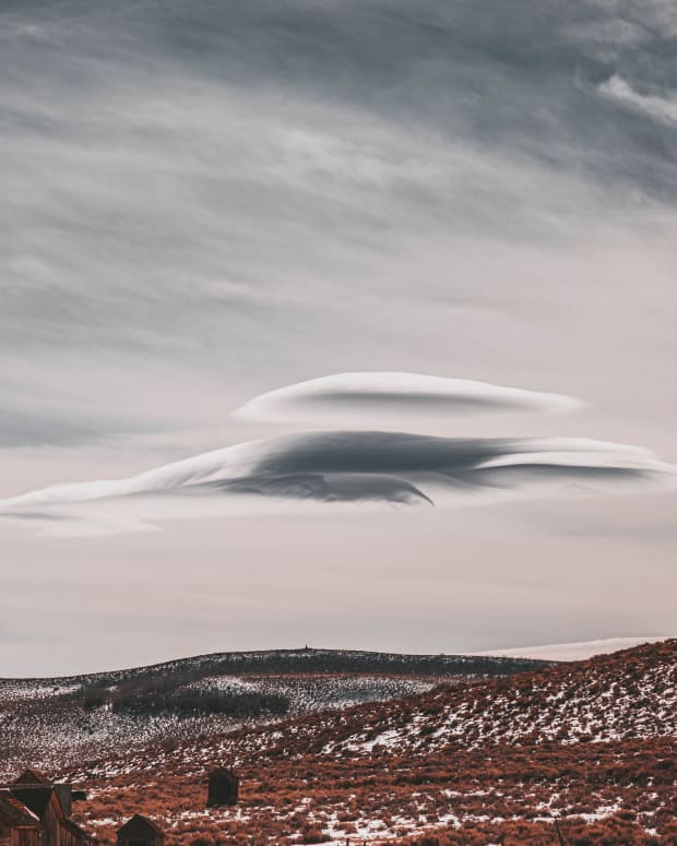 a cloud that looks like a UFO over a frozen plain in Canada