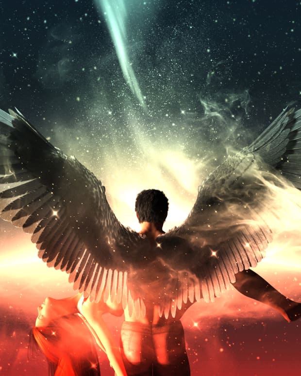 an angel with huge wings shot from behind against a brilliant starry sky