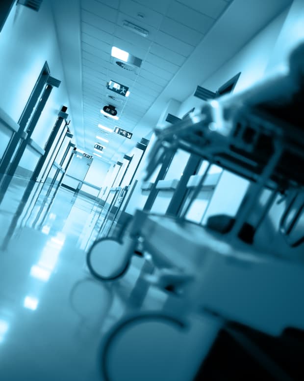 blue tinged low angle shot of a hospital corridor
