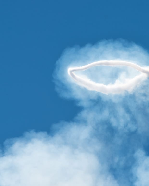 smoke ring in the blue sky