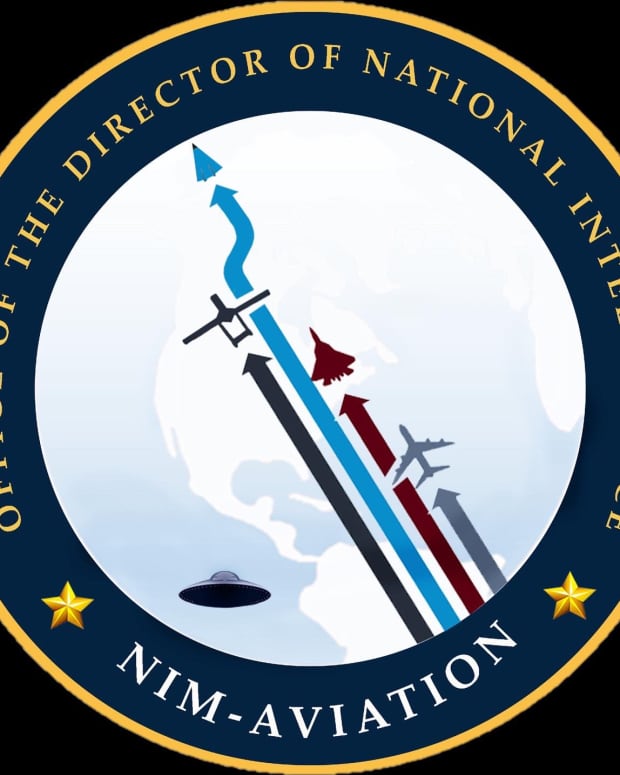 the "unofficial and erroneous" logo seen for NIM-A, with a UFO on it.