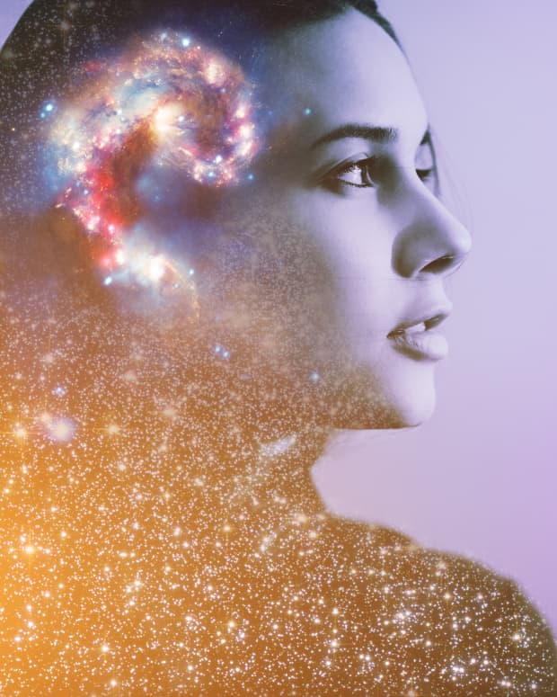 a woman superimposed on a cosmic nebula