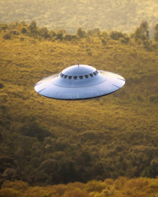 UFO Flying Over Field